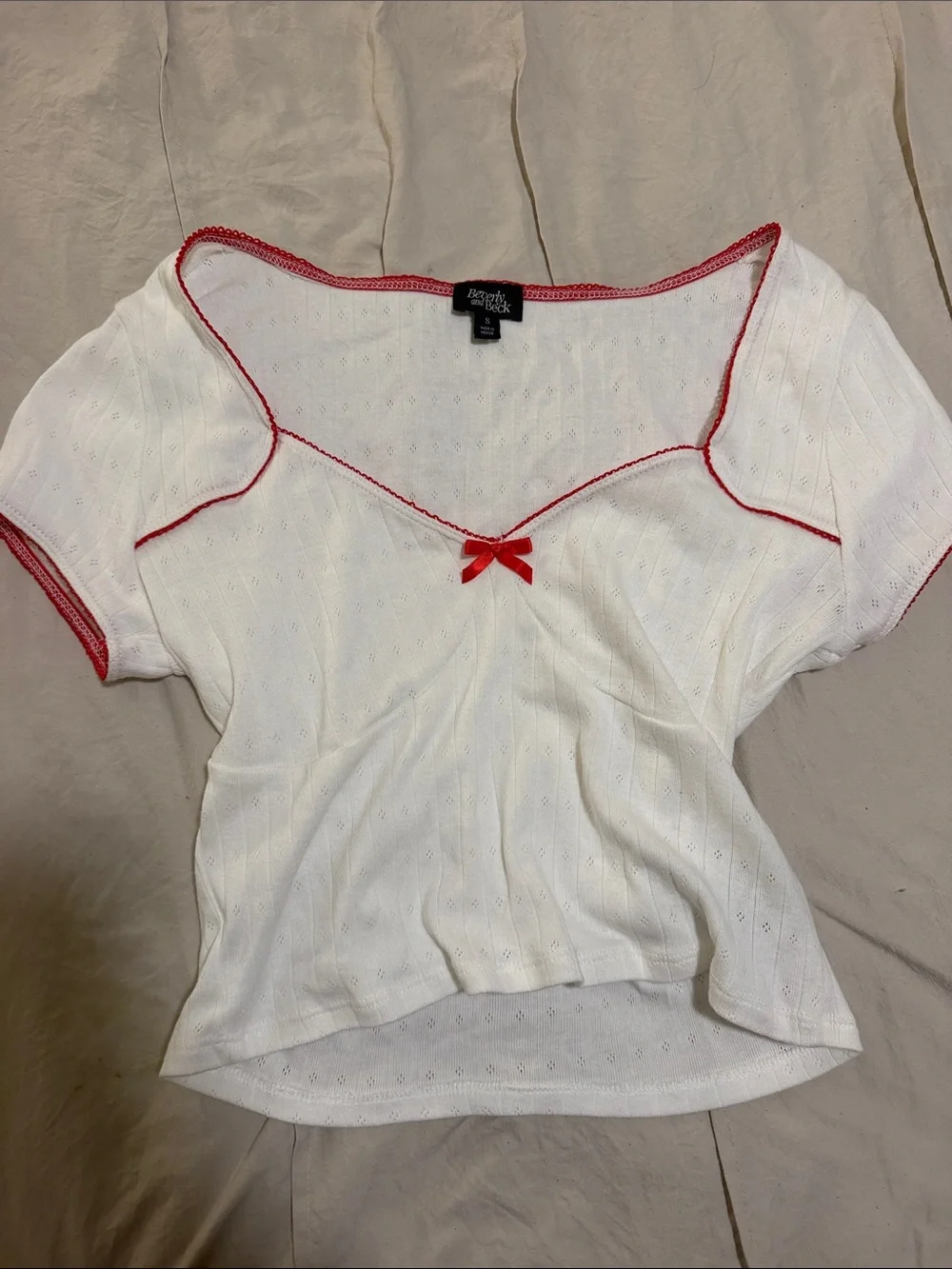 PacSun White Knit Crop Top with Red Trim and Bow Accent